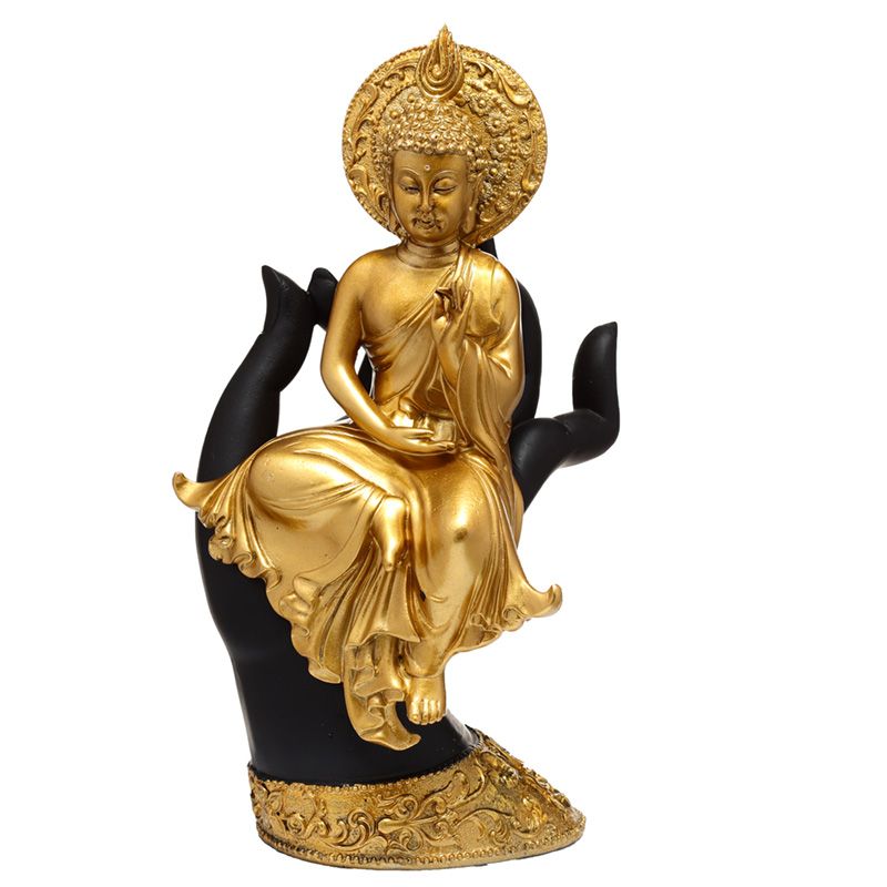 Goldener  Thai-Buddha in einer Hand sitzend