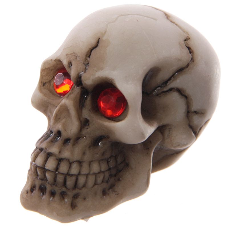 Grauenhafter Totenkopf Rote Edelstein Augen